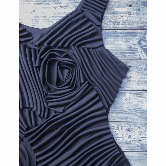 Detail: Front of 3D effect stitched flounces dress.
