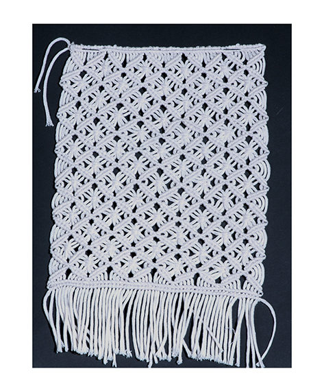 Cotton macramè plaited by hand on a loom